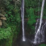 Aerial view of famous Sekumpul waterfalls in Bali, Indonesia. Tropical jungle rainforest